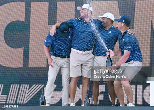 Bryson DeChambeau, Anirban Lahiri, Charles Howell III, and Paul Casey celebrate after the LIV Golf Invitational - Chicago at Rich Harvest Farms on...