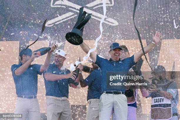 Bryson DeChambeau, Anirban Lahiri, Charles Howell III, and Paul Casey celebrate after the LIV Golf Invitational - Chicago at Rich Harvest Farms on...