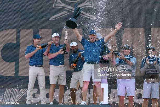 Bryson DeChambeau, Anirban Lahiri, Charles Howell III, and Paul Casey celebrate after the LIV Golf Invitational - Chicago at Rich Harvest Farms on...