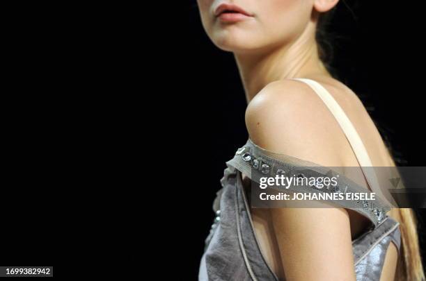 Model presents fashion by German label "Schumacher" for the Spring/Summer 2011 collections during the Berlin Fashion Week on July 9, 2010 in Berlin....