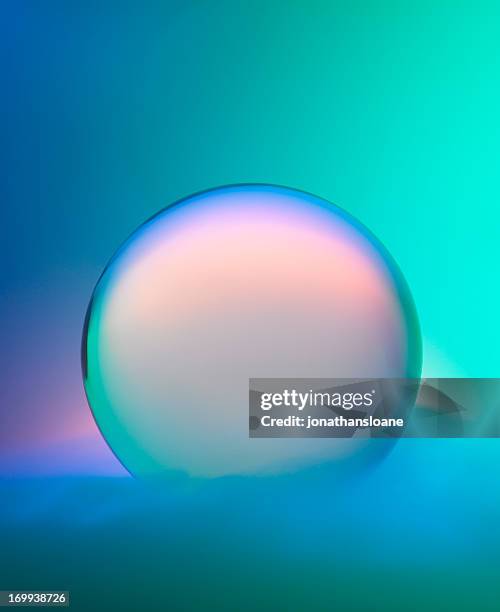 magic crystal ball with mist and colors - glass circle stockfoto's en -beelden