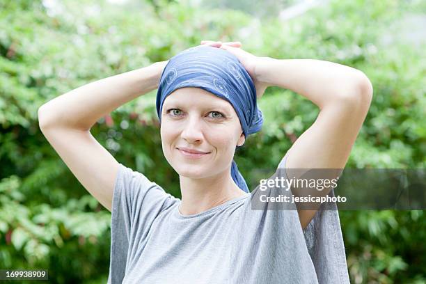 smiling woman with cancer - head scarf stock pictures, royalty-free photos & images