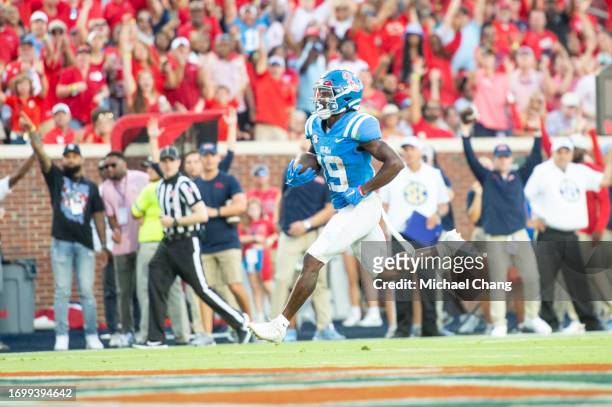 Wide receiver Dayton Wade of the Mississippi Rebels runs the ball in for a touchdown during the first half of their game against the LSU Tigers at...