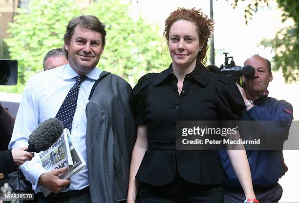 Rebekah Brooks, the former head of News International, and her husband Charles Brooks, arrive at Southwark Crown Court, where they are due to appear...