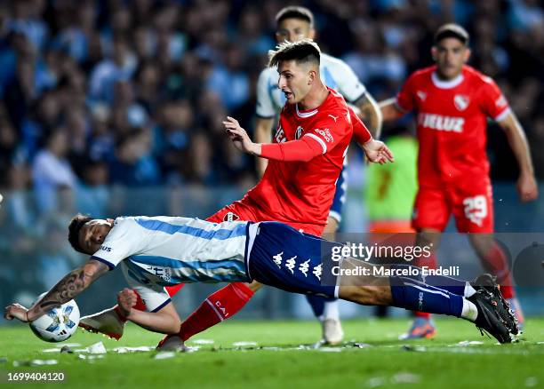Nazareno Colombo of Racing Club concedes a penalty after blocking the ball with the hand during a match between Racing Club and Independiente as part...