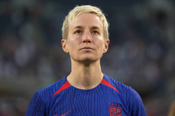 Megan Rapinoe of the United States watches a tribute video after playing in her final national team match against South Africa at Soldier Field on...