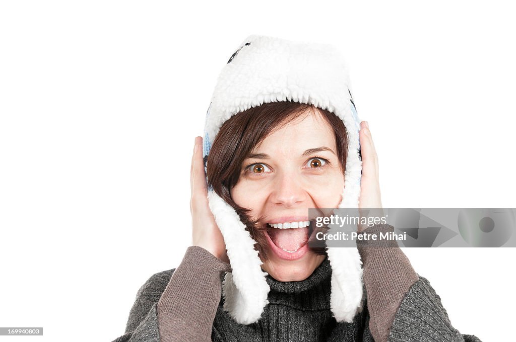 Happy woman with a winter hat