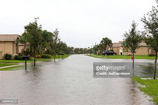 flooding from a hurricane - flood insurance stock pictures, royalty-free photos & images