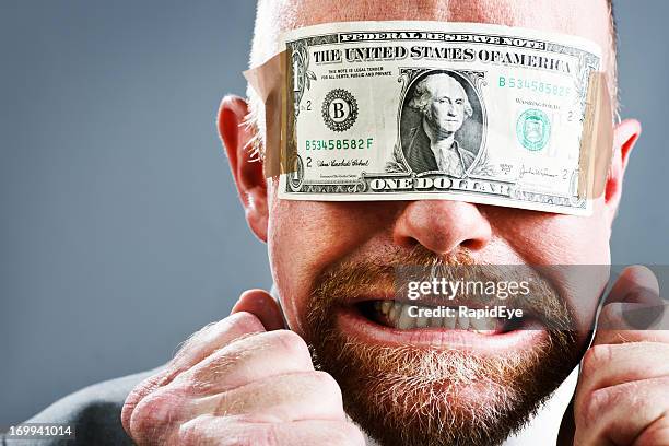 furious frustrated businessman in us dollar bill blindfold - rea001 stock pictures, royalty-free photos & images