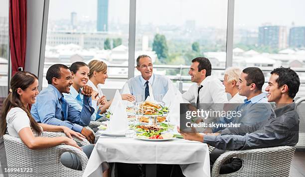businesspeople on lunch - corporate lunch stock pictures, royalty-free photos & images