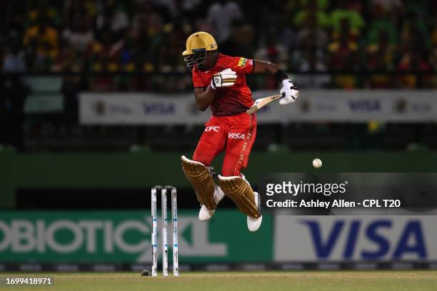 Dwayne Bravo of Trinbago Knight Riders plays a short ball bowled by Ronsford Beaton of Guyana Amazon Warriors during the Republic Bank Caribbean...