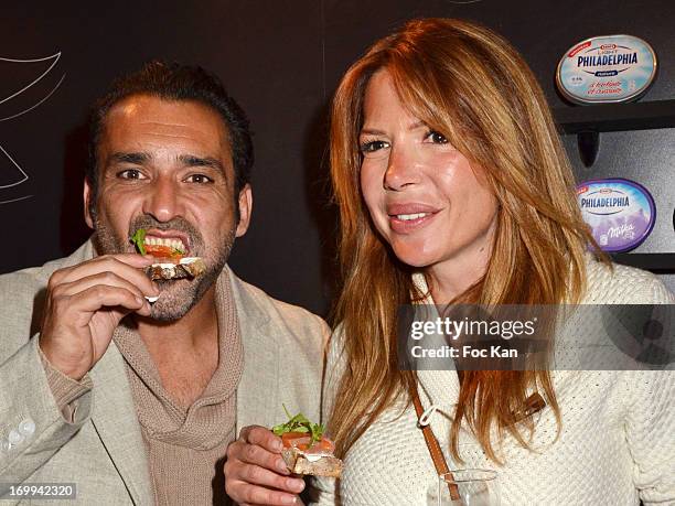 Jean Pierre Martins and Alexandra Genoves attend the Philadelphia 'Bar A Tartines' Launch Party In Paris at the Philadelphia Ephemere Shop on June 4,...