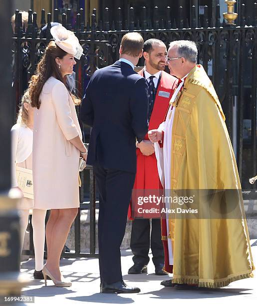 Catherine, Duchess of Cambridge and Prince William, Duke of Cambridge chat to The Very Reverend Dr John Hall while attending a service of celebration...