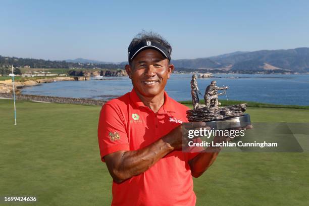 Thongchai Jaidee of Thailand poses with the trophy after winning PURE Insurance Championship at Pebble Beach Golf Links on September 24, 2023 in...