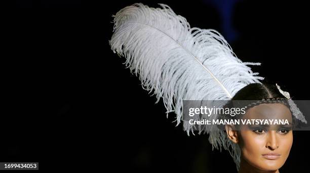 Model presents a creation by Indian designer Suneet Varma during the Wills India Fashion Week Spring Summer 2010 in New Delhi on October 27, 2009....