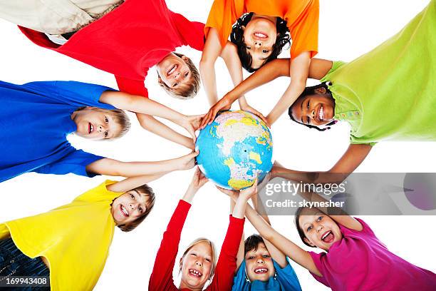 cute children and the globe. - child globe stockfoto's en -beelden