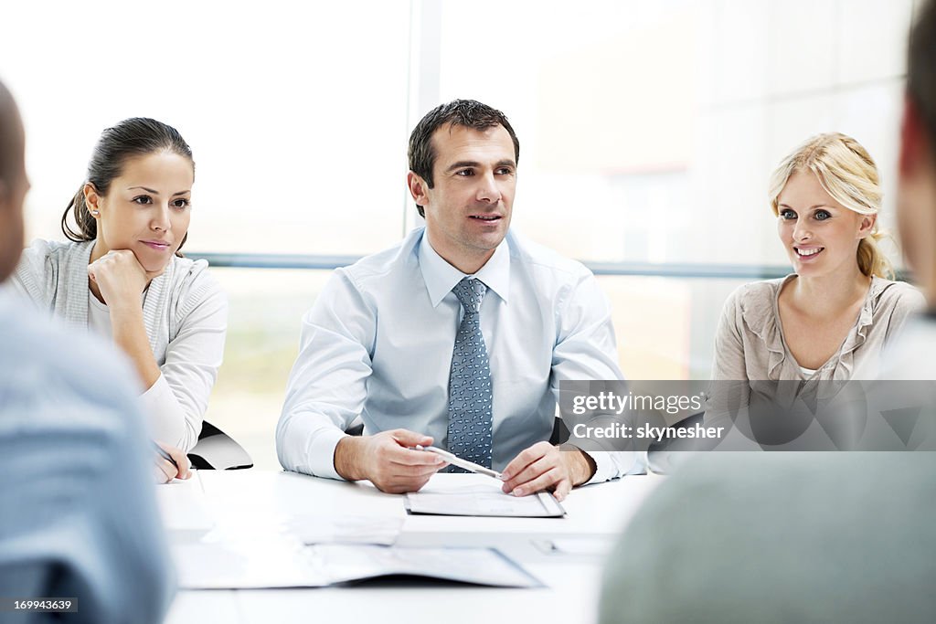 Group of businesspeople having a meeting.