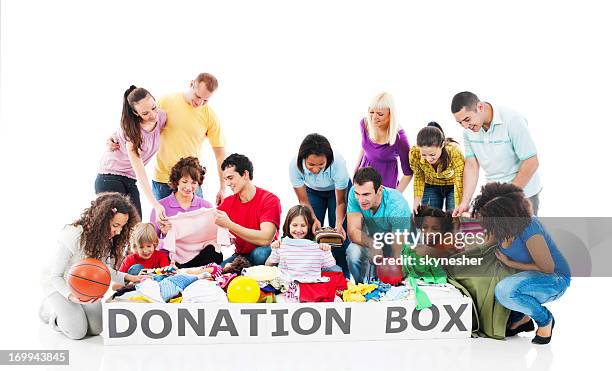 volunteers with full donation box. - donation box white background stock pictures, royalty-free photos & images