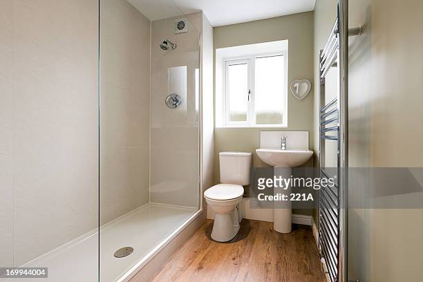 modern compact bathroom - screen partition stock pictures, royalty-free photos & images