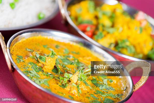 indian food: butter chicken with basmati rice and aloo gobi - vegetable curry stock pictures, royalty-free photos & images