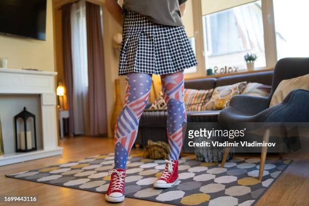 body of a person wearing fashionable tights - american flag small stock pictures, royalty-free photos & images