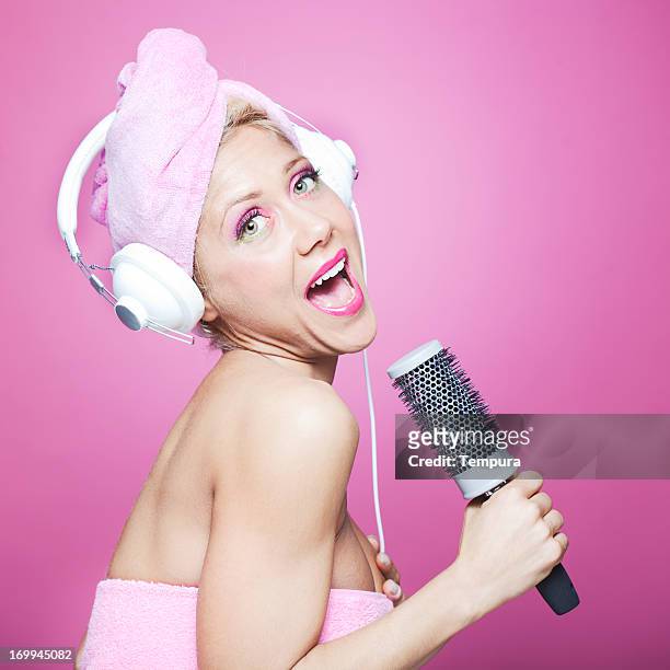 singing in the bathroom with a hair brush_ humor - singing shower stock pictures, royalty-free photos & images