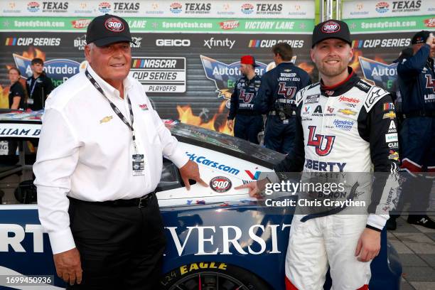 Hall of Famer Rick Hendrick team owner of Hendrick Motorsport and William Byron, driver of the Liberty University Chevrolet, celebrate Hendrick...