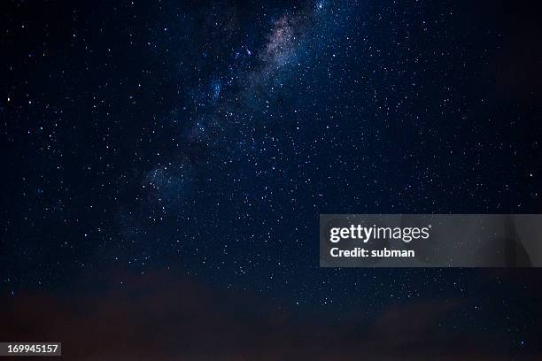 southern skies - galaxy background stock-fotos und bilder