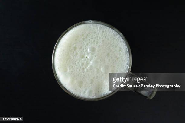 top view of salty lassi - buttermilch stock-fotos und bilder
