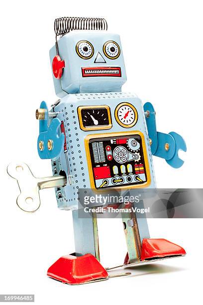 retro brinquedo robô de estanho - wind up toy imagens e fotografias de stock