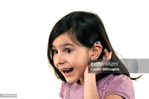 hearing aid - young girl white background stock pictures, royalty-free photos & images