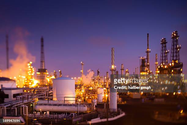 oil refinery at dusk (tilt-shift) - energy industry heat steam stock pictures, royalty-free photos & images