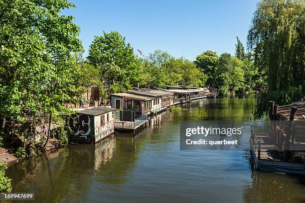 wooden huts in berlin. club scene with restaurants. - spree river stock pictures, royalty-free photos & images