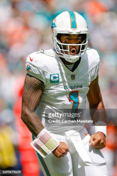 Tua Tagovailoa of the Miami Dolphins in action against the Denver Broncos at Hard Rock Stadium on September 24, 2023 in Miami Gardens, Florida.