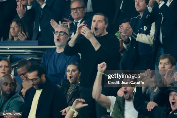 Selena Gomez and Brooklyn Beckham celebrate the first goal of PSG during the Ligue 1 Uber Eats match between Paris Saint-Germain and Olympique de...