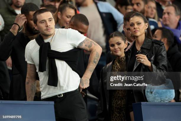 Brooklyn Beckham, Selena Gomez and Nicola Peltz attend the Ligue 1 Uber Eats match between Paris Saint-Germain and Olympique de Marseille at Parc des...