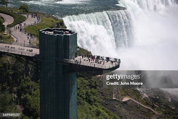 Prospect Point Tourists stand atop the Prospect Point Observation Tower overlooking ...