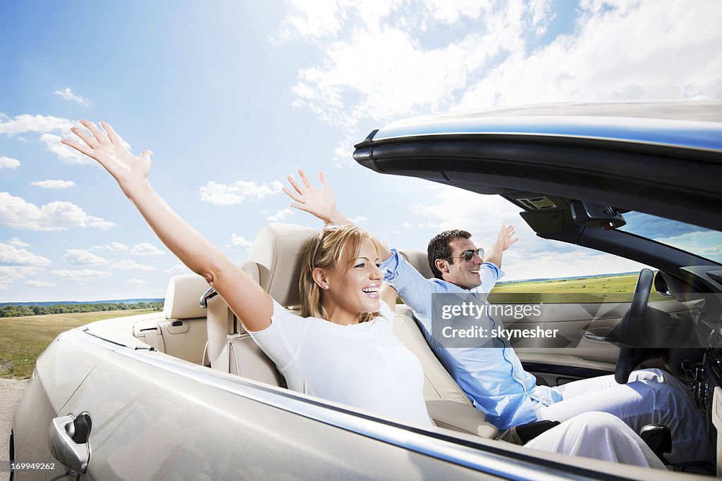 Enjoying your life in a cabriolet car!