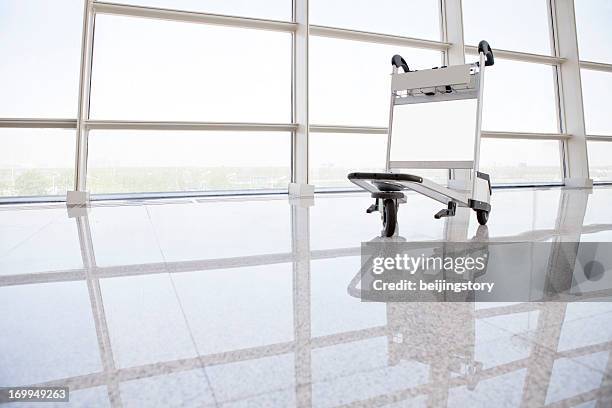 airport travel--luggage cart - luggage trolley stock pictures, royalty-free photos & images