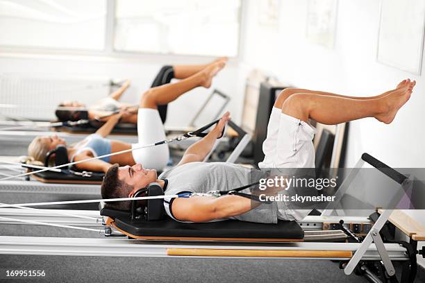 gymnastics pilates - reformer stock pictures, royalty-free photos & images