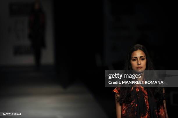 Model presents a creation by Indian designer Prashant Verma during the Wills India Fashion Week Spring Summer 2010 in New Delhi on October 28, 2009....