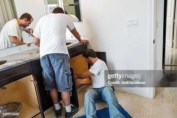 installing granite and bathroom sink - messy medicine cabinet stock pictures, royalty-free photos & images