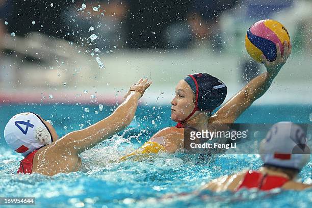 Courtney Mathewson of the United States challenges with Sun Yujun of China during fifth day of the FINA Women's World League Super Final 2013 match...