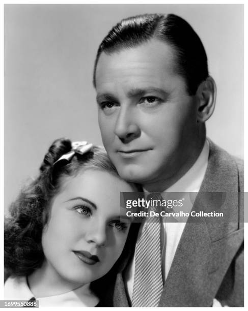 Publicity portrait of Canadian actor and singer Deanna Durbin and British actor Hebert Marshall in the film 'Mad About Music' United States.