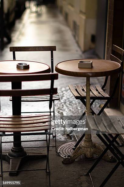 parisian cafe table - paris sidewalk cafe stock pictures, royalty-free photos & images