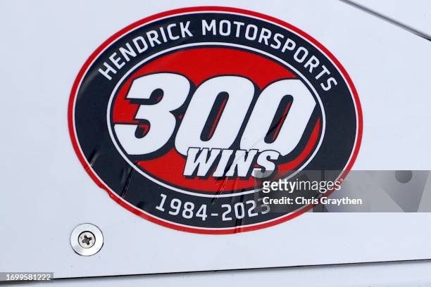 Detail view of the "Hendrick Motorsports 300th Wins 1984-2023" sticker on the the Liberty University Chevrolet celebrating Hendrick Motorsports'...