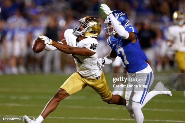 Tobias Merriweather of the Notre Dame Fighting Irish misses a pass while defended by Al Blades Jr. #7 of the Duke Blue Devils during the first half...