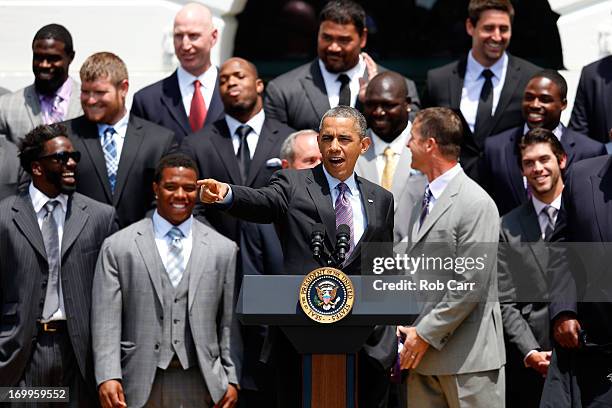 President Barack Obama gestures while welcoming members of the National Football League Super Bowl champion Baltimore Ravens Super Bowl winning team...