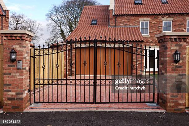 new gated house - house gates stock pictures, royalty-free photos & images