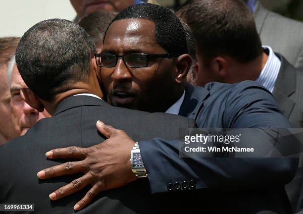 Baltimore Ravens linebacker Ray Lewis hugs U.S. President Barack Obama after Obama welcomed members of the National Football League Super Bowl...
